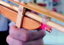 Rubber Band Gun With a Laser Sight Via bit.ly2oOrUTQ