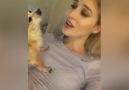 Singer And Dog Singing Together