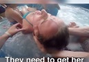 Terrifying moment a woman cracks her head on a water slide