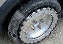 These wheels enable a car to glide laterally along the ground.
