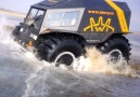 The SHERP ATV tears through ice mud and deep water.