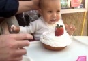 This baby is NOT happy about being pied by her own mum.
