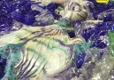 This mermaid is drowning in 10000 plastic bottles