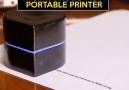 This Mini Robot Is A Portable Printer