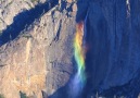 This rainbow waterfall is absolutely breathtaking!