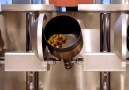 This robotic kitchen cooks your food in three minutes or less.