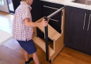 This step stool pulls out from a cabinet.