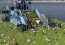 This trash boat collects garbage from polluted rivers.