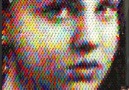 Thousands of Crayons Stacked to Form Beautifully Pixelated Por...