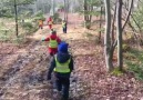 Toddler ForestKids excited to get to the chickens.