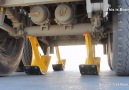 Trailer axle lifting device.