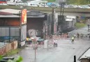 Train Blasting Through Flooded Streets
