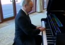 Vladimir Putin taking his time to perfect the beat...