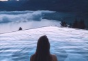 Watching the sunrise from a hot tub in the Swiss mountains