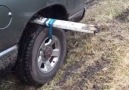 Watch this ingenious maneuver to get your car out of the mud!