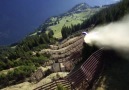 Wingsuit flight through a Farmers land in the Swiss alps