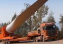Witness the journey of wind turbine blades to the top of a mountain.